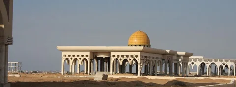 Documentary photograph of the destroyed passenger terminal and architectural dome at Gaza International Airport, captured in June 2008.